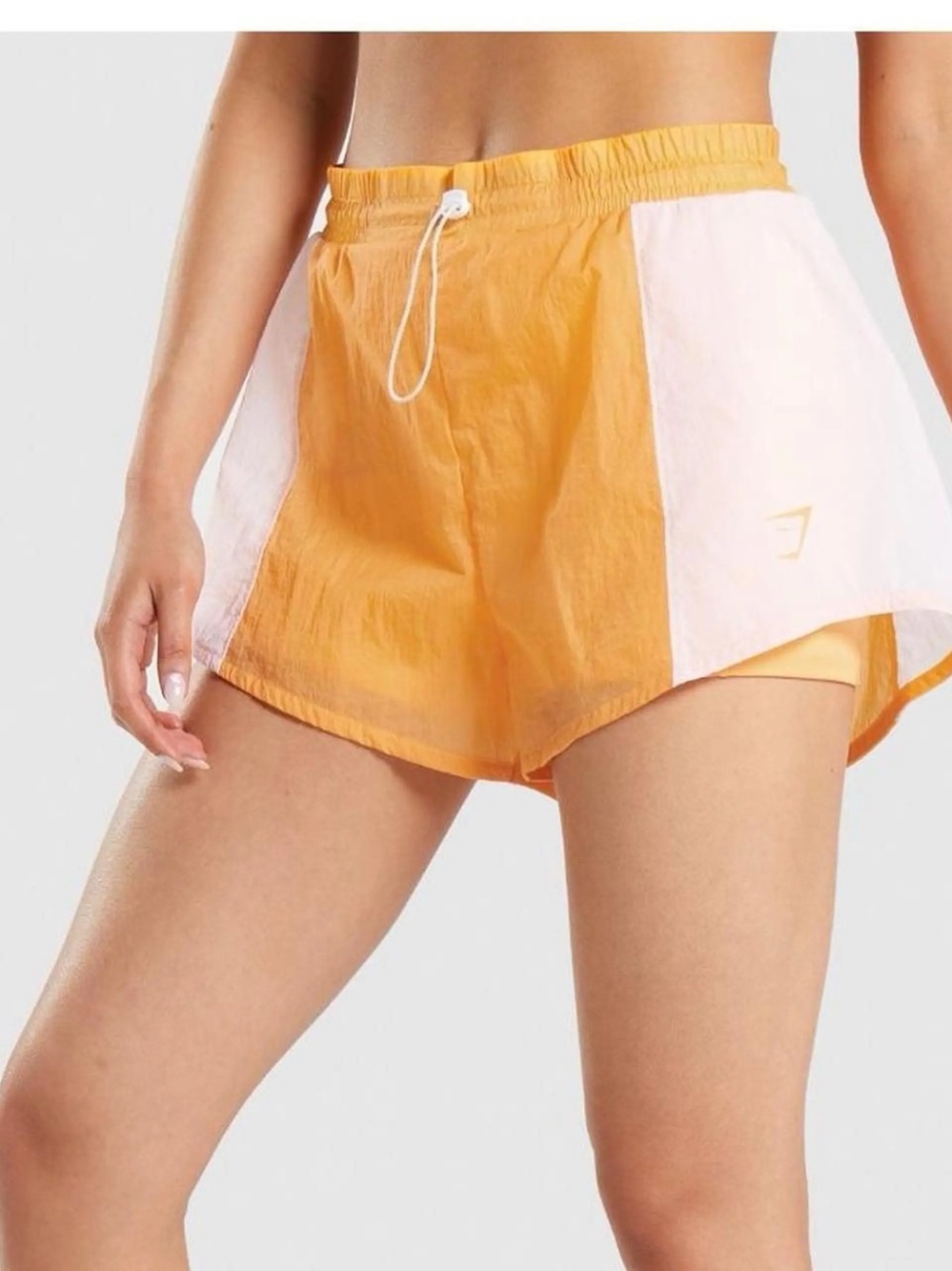 Gymshark Women’s Orange and White Athletic Shorts